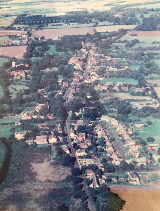 Aerial view of the village with site BK3 at the top
